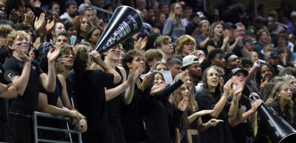 Panther Creek students in the stands celebrating the school as one body. 